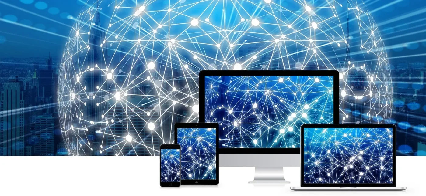 LaunchPad Web Designs showcases responsive websites on desktop, laptop, tablet, and mobile phone, connected by a global network.