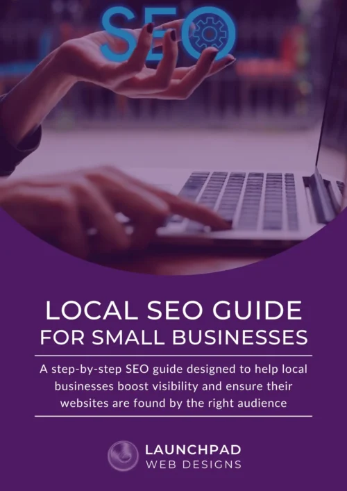 Cover image for Launchpad Web Designs' Local SEO Guide for Small Businesses, featuring a hand holding glowing SEO text above a laptop, emphasizing boosting local visibility and reaching the right audience.