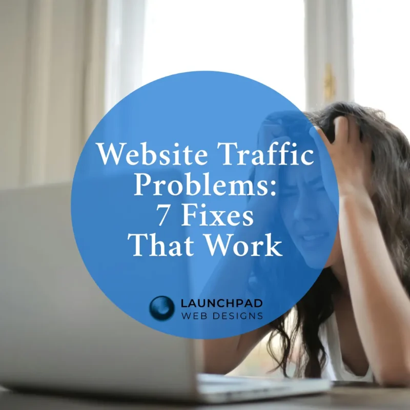 Image of a frustrated person with their head in their hands, looking at a laptop screen, symbolizing common website traffic problems and the stress small business owners face. This visual promotes the Launchpad Web Designs blog article, 'Website Traffic Problems: 7 Fixes That Work,' offering actionable solutions to boost website performance and overcome low traffic for small businesses.