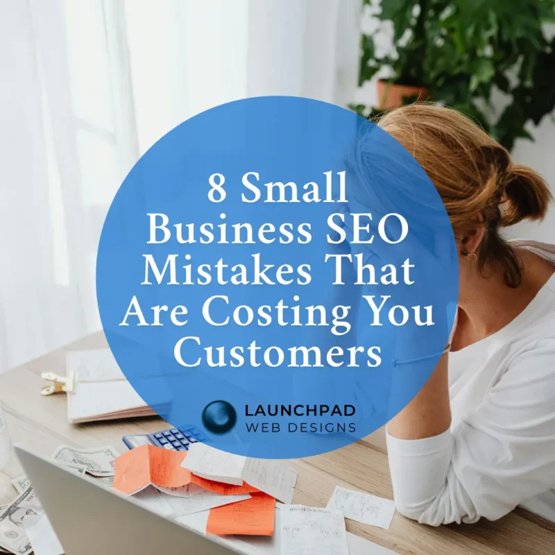 A frustrated small business owner, a woman with her head in her hands, sits at a desk cluttered with a laptop, calculator, and scattered receipts. The image has a blue overlay with text reading "8 Small Business SEO Mistakes That Are Costing You Customers" and the LaunchPad Web Designs logo. This alt text is useful for a blog post or article about common small business SEO mistakes.