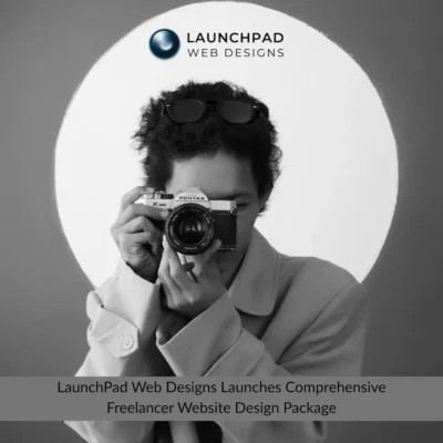 A professional headshot of a freelancer, a person with dark, curly hair wearing sunglasses on their head and holding a Pentax film camera to their eye. The image has a spotlight effect and a logo for "LAUNCHPAD WEB DESIGNS" in the top right. A text overlay reads "LaunchPad Web Designs Launches Comprehensive Freelancer Website Design Package." This alt text is useful for a press release announcing new freelancer web design packages.
